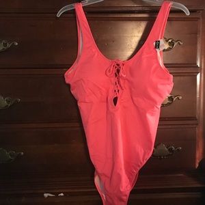 BNWT Victoria Secrets Pink 1 piece suit.